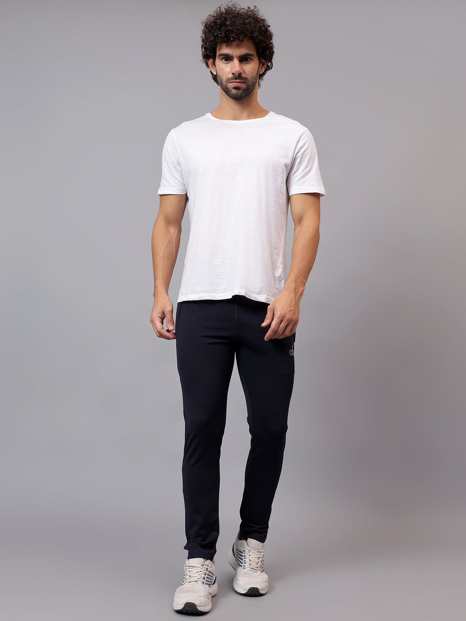 Model wearing Athfuel Vulcan Trackpants during workout – Blue