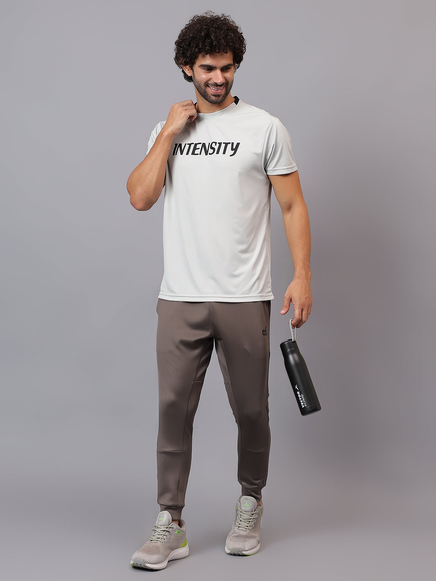 Model wearing Athfuel Drift Joggers for workout and everyday comfort – Dust Brown