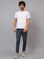 Model wearing Athfuel Vulcan Trackpants for gym and active movement – Dark Grey