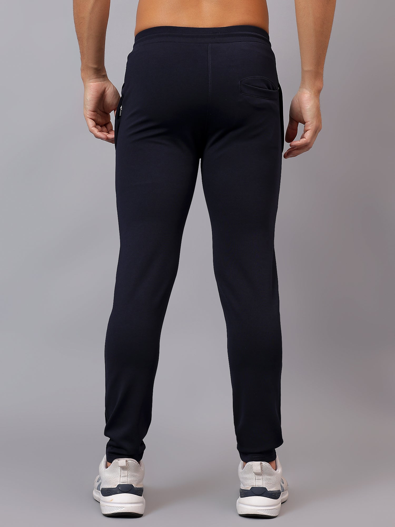 Back view of Athfuel Vulcan Trackpants featuring a clean athletic silhouette – Blue