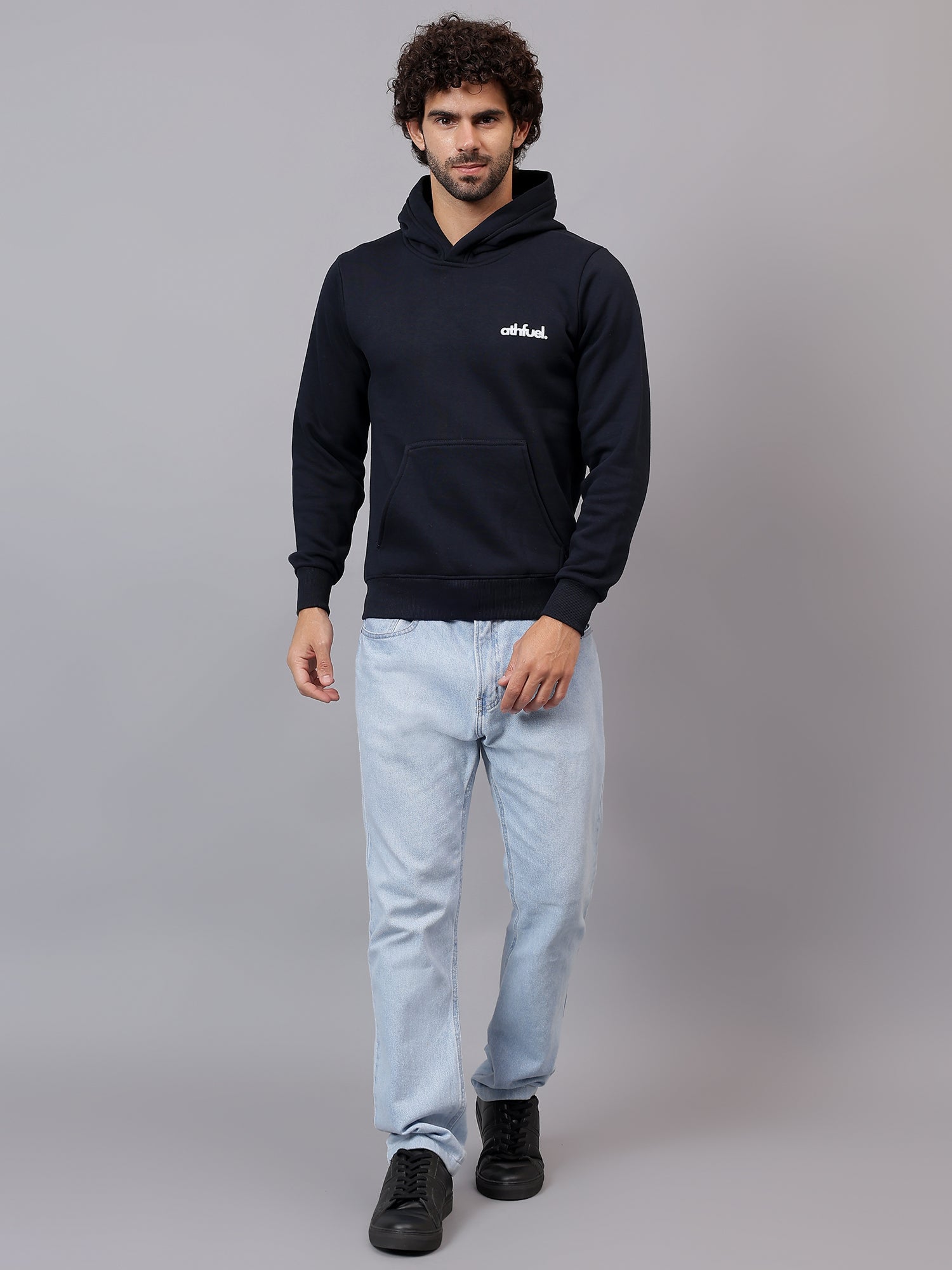 Model wearing Athfuel “I’m OK” printed hoodie, showcasing modern streetwear style in Dark Blue