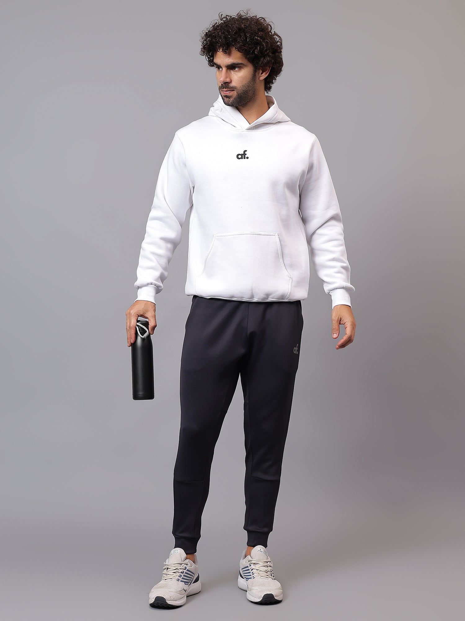 Model wearing Athfuel Drift Joggers during training session – Blue