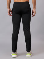 Back view of Athfuel Vulcan Trackpants showing clean tapered silhouette – Black