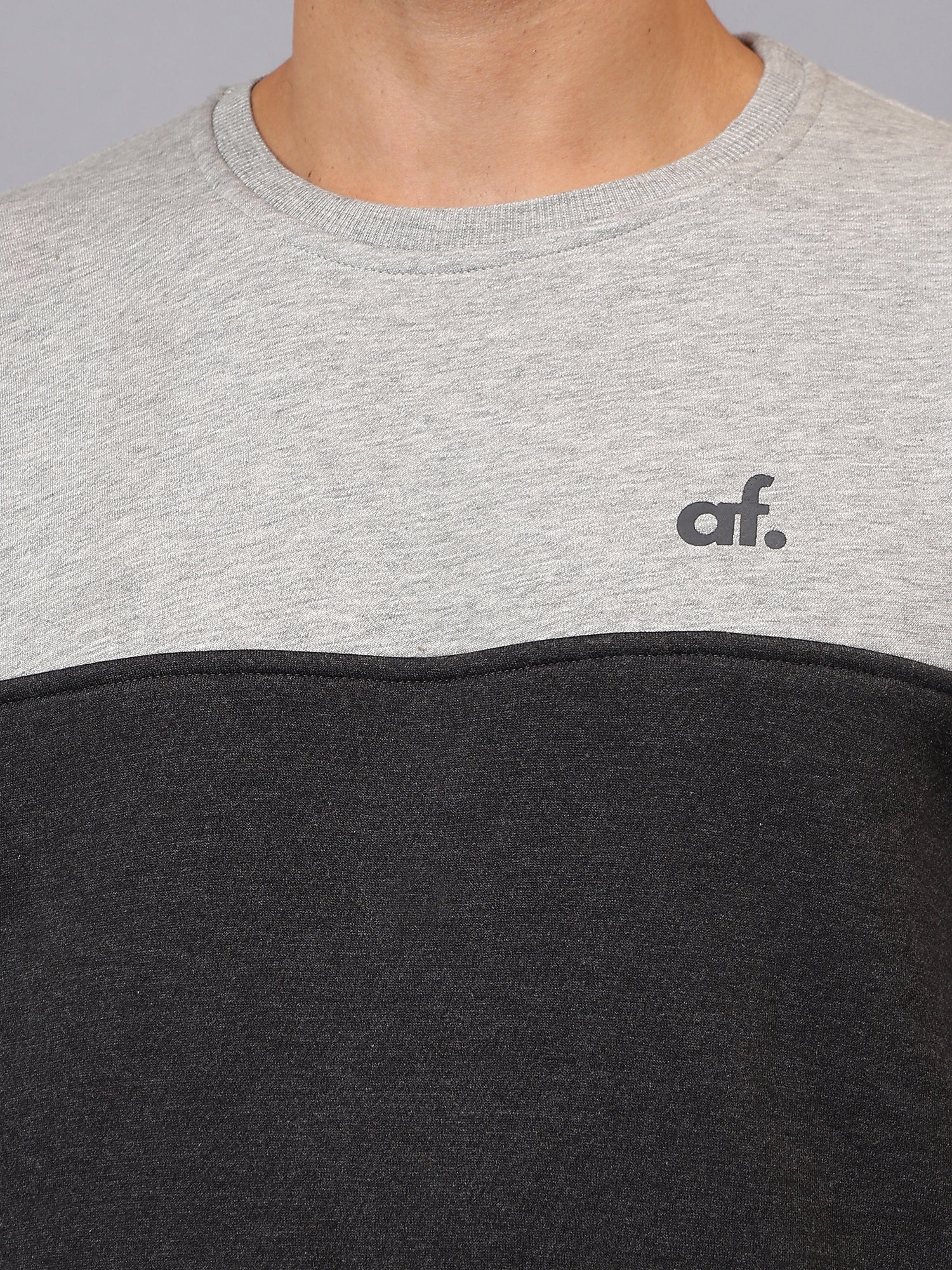 Close view of ribbed neckline and premium stitching on Athfuel Merge two-tone sweatshirt in Grey-DarkGrey
