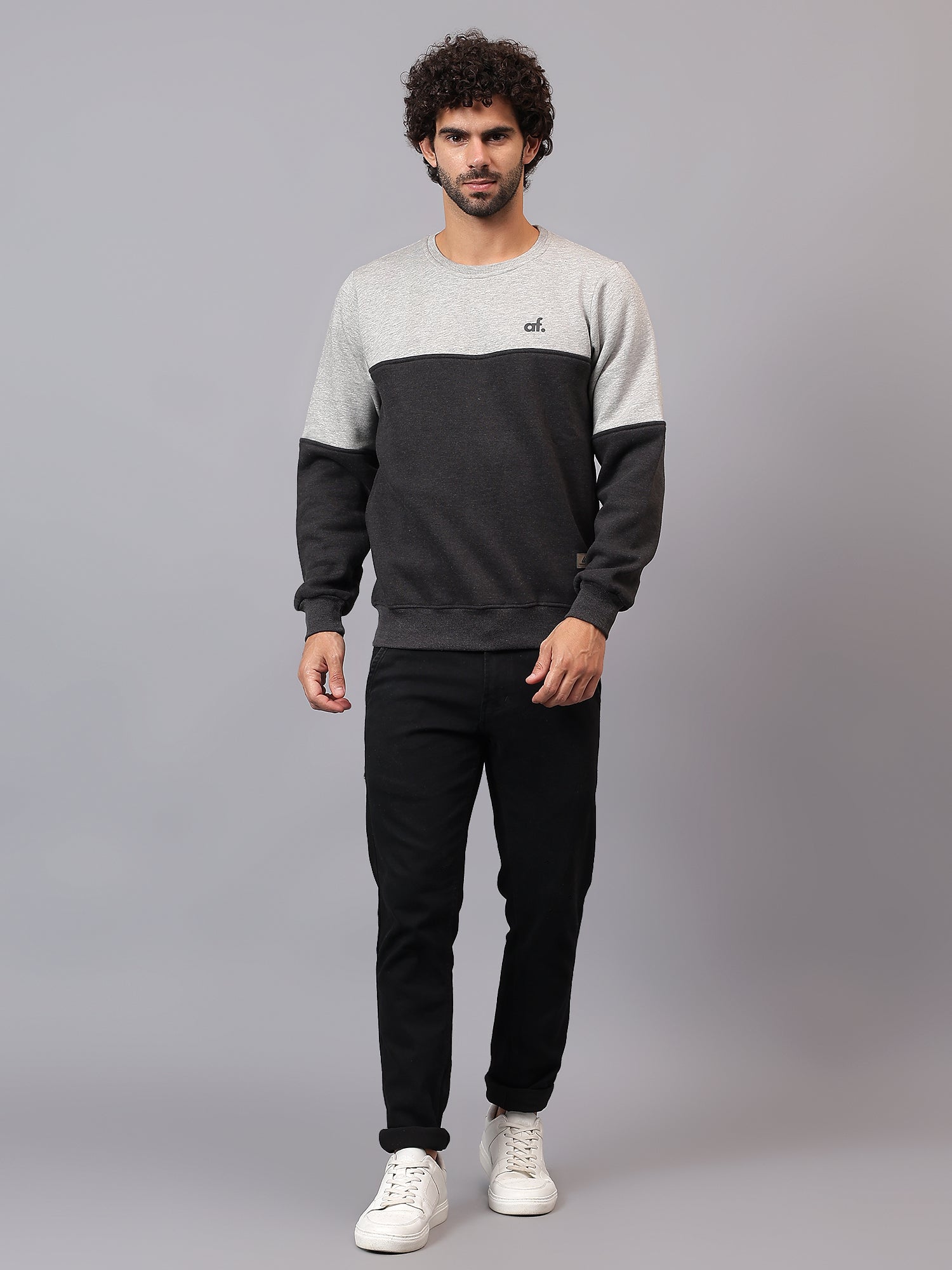 Model wearing Athfuel Merge two-tone sweatshirt styled casually in Grey-DarkGrey