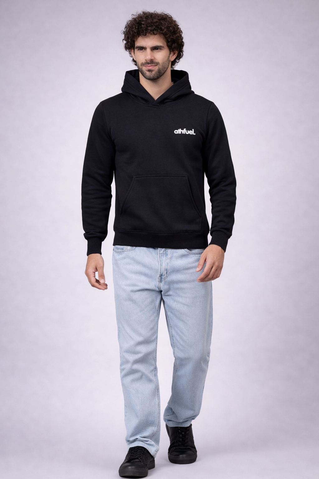 Model wearing Athfuel “I’m OK” printed hoodie, showcasing modern streetwear style color Black